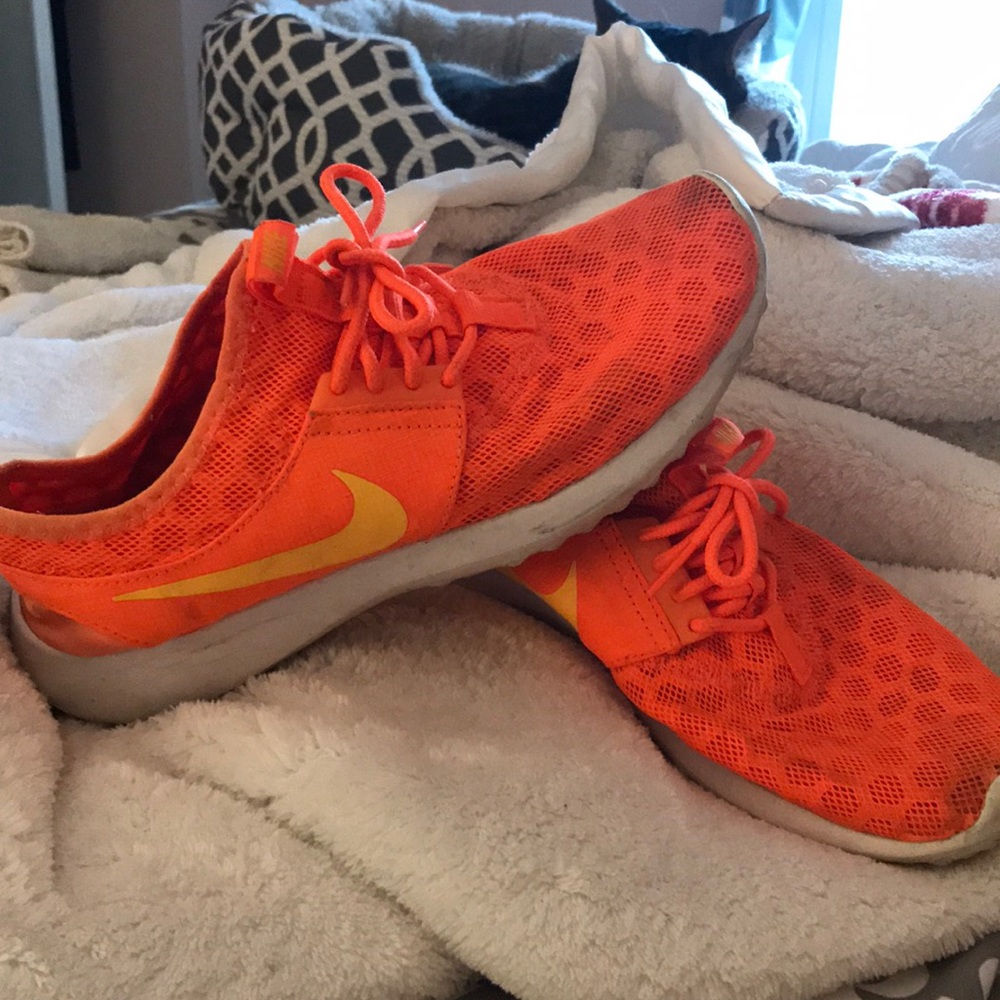 Neon orange Nike juvenate